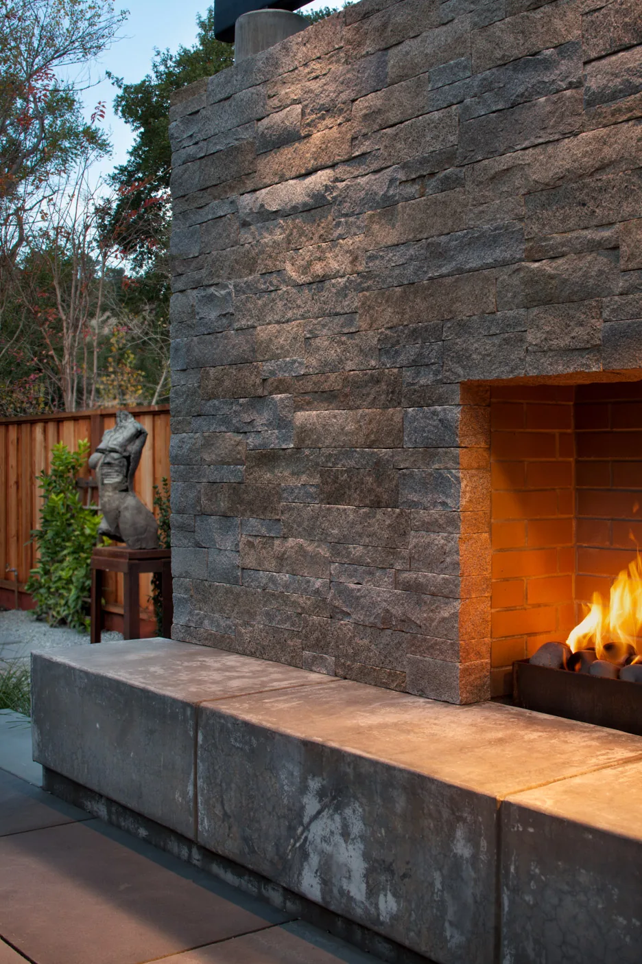 Lafayette Residence — outdoor gas fireplace anchoring the rear gathering area