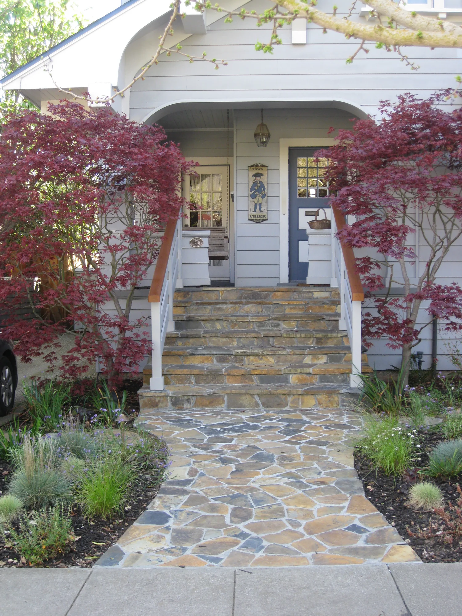 After — the new stone entry walk and steps, built by my own crew