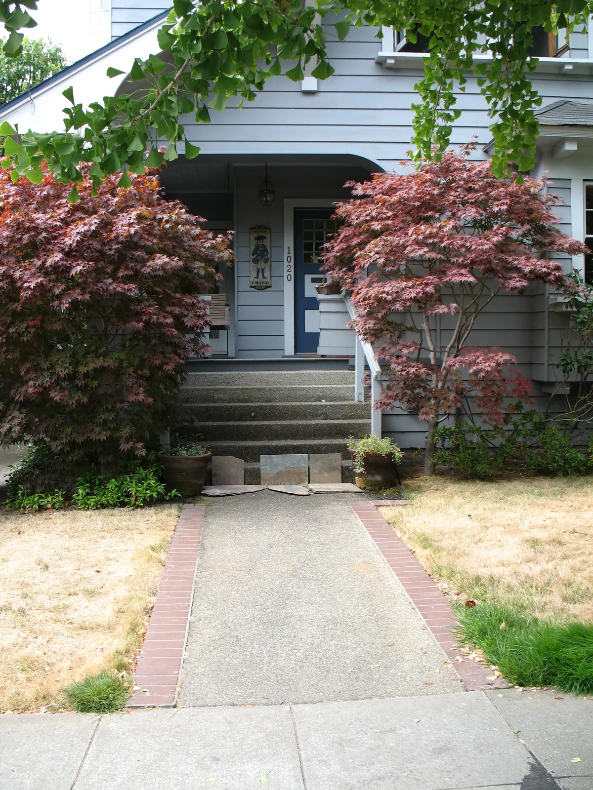 Before — the original entry walk and steps prior to construction
